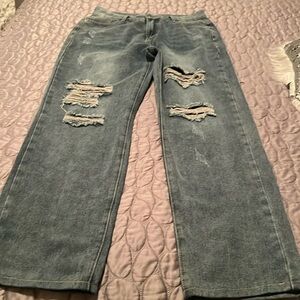 DISTRESSED JEANS